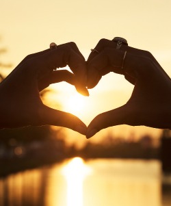 Image of light shining through heart shape