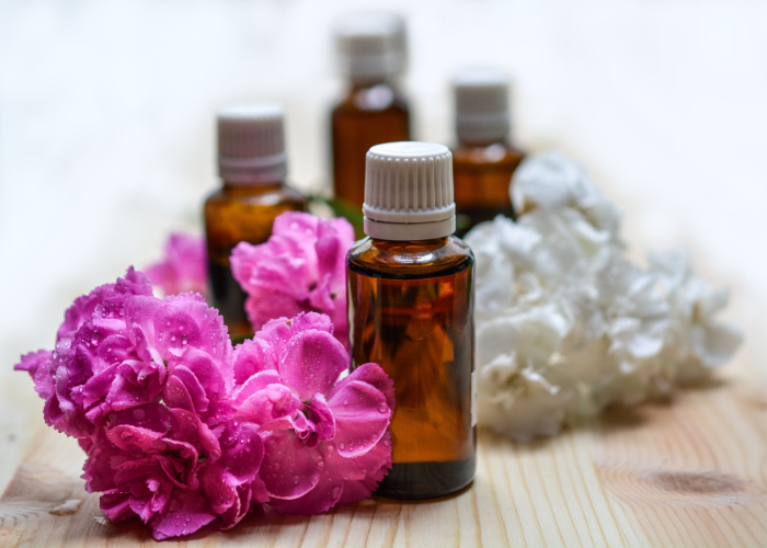 Image of essential oil bottles and roses